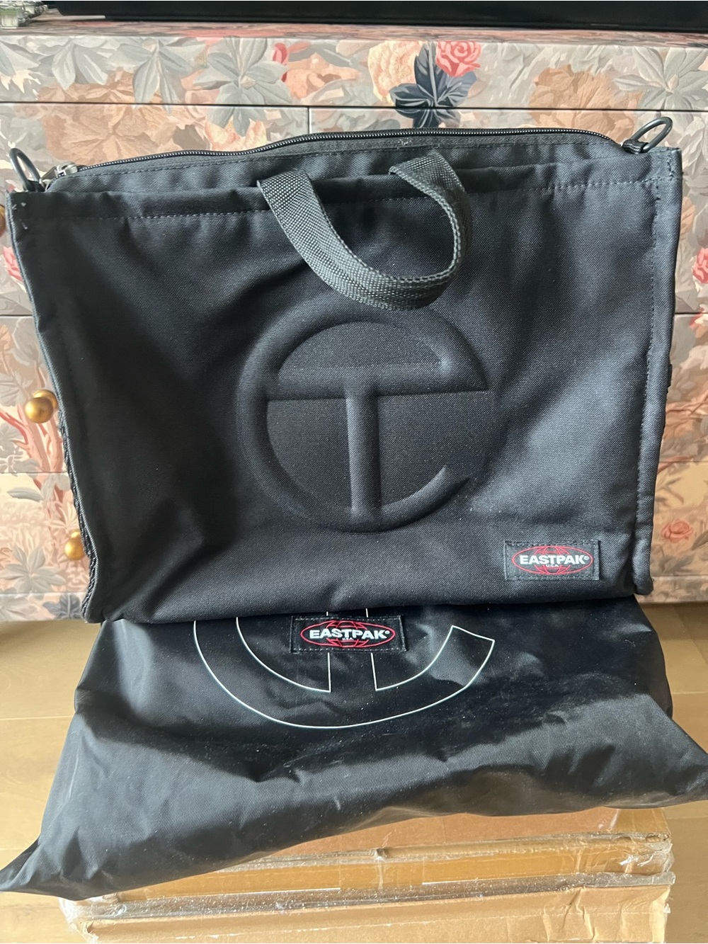 Eastpak Black Messenger backpack / Tote with Embossed Logo and dust bag